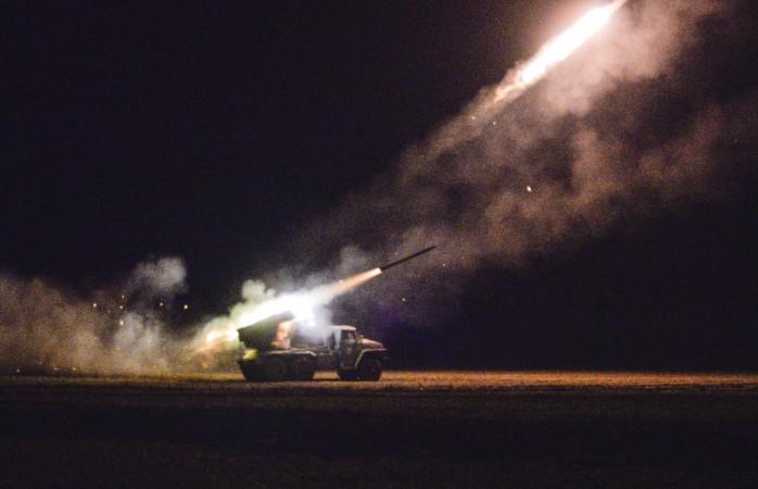 Ukrainian servicemen launch a Grad rocket towards pro-Russian separatist forces outside Debaltseve, eastern Ukraine February 8, 2015 Ukrainian servicemen launch a Grad rocket towards pro-Russian separatist forces outside Debaltseve, eastern Ukraine February 8, 2015