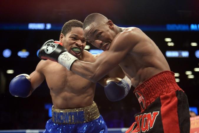 Shawn Porter (in blue shorts) is not sure as to whether the fight of the century will happen Shawn Porter
