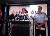 Australian Federal Police Deputy Commissioner Michael Phelan (R) listens as New South Wales Deputy Police Commissioner Catherine Burn speaks during a media conference in Sydney February 11, 2015. Australian counter-terrorism police said on Wednesday they