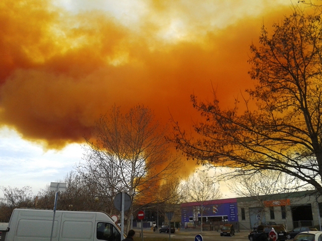 An orange toxic cloud is seen over the town of Igualada, near Barcelona following an explosion in a chemical plant. Orange Toxic Cloud in Spain