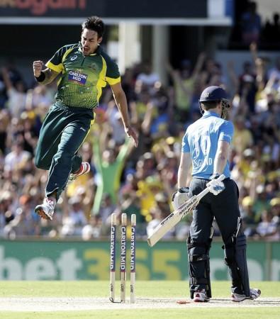 Australia fast bowler Mitchell Johnson celebrates after dismissing England captain Eoin Morgan in the tri-series final Mitchell Johnson Australia Eoin Morgan England
