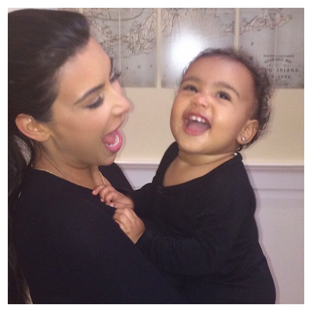 Kim Kardashian with North West Kim Kardashian with North West
