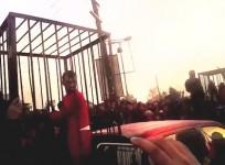 An ISIS video showed 17 Peshmerga soldiers being paraded in cages.