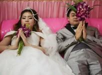 Bride and Groom Exchange Wedding Vows in Coffins in Bangkok.