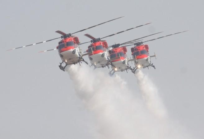 IAF aircrafts perform aerobatics during the Aero India-2015 Air Show, at Yelahanka Air-force Station, in Bengaluru on Feb 18, 2015. (Photo: IANS) AE 2
