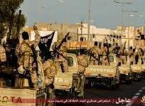 Isis Libya convoys pass through the streets of Libya as its fighters aim their guns to the sky in defiance to the air strikes by Egypt.