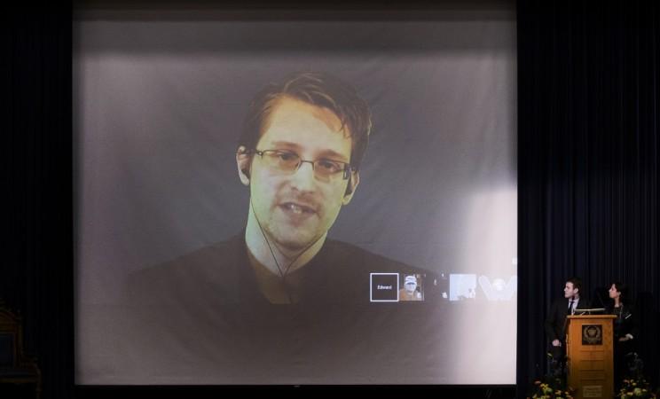 Former U.S. National Security Agency contractor Edward Snowden appears live via video with journalist Glenn Greenwald during a student organized world affairs conference at the Upper Canada College private high school in Toronto, February 2, 2015. Former U.S. National Security Agency contractor Edward Snowden appears live via video with journalist Glenn Greenwald during a student organized world affairs conference at the Upper Canada College private high school in Toronto, February 2, 2015.