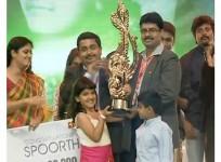 Spoorthi Receiving Super Singer Junior Season 4 Trophy