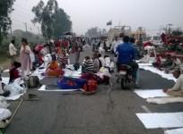 Protesters March against the Land Acquisition Ordinance