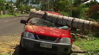 residents-survey-cyclone-damage-in-australia