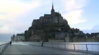 high-tide-brings-onlookers-to-mont-saint-michel-landmark