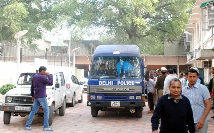 The five people arrested by the Delhi Police for stealing documents and leaking them to corporate houses being taken to be produced before a Delhi Court on Feb 20, 2015. The arrested people include two employees of the petroleum ministry. corporate espionage