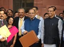 Finance Minister Arun Jaitley and Minister of State for Finance, Jayant Sinha along with the team at North Block before going to Parliament to present the Union Budget in New Delhi on Feb. 28, 2015.