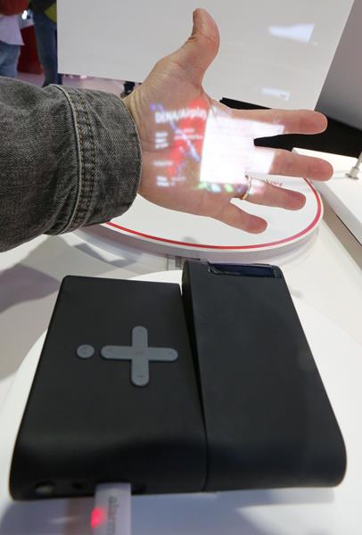 A Lenovo Pocket Projector is pictured during the Mobile World Congress in Barcelona March 5, 2015. Ninety thousand executives, marketers and reporters gather in Barcelona this week for the telecom operators Mobile World Congress, the largest annual trade 