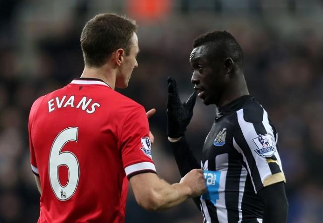 Jonny Evans argues with Papiss Cisse during Manchester United's clash against Newcastle United at St James' Park on Wednesday. Jonny Evans and Papiss Cisse