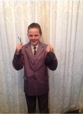 Liam Scholes went to school dressed in a grey suit with slicked black hair,dressed as Christian Grey from Fifty Shades of Grey.