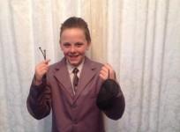 Liam Scholes went to school dressed in a grey suit with slicked black hair,dressed as Christian Grey from Fifty Shades of Grey.