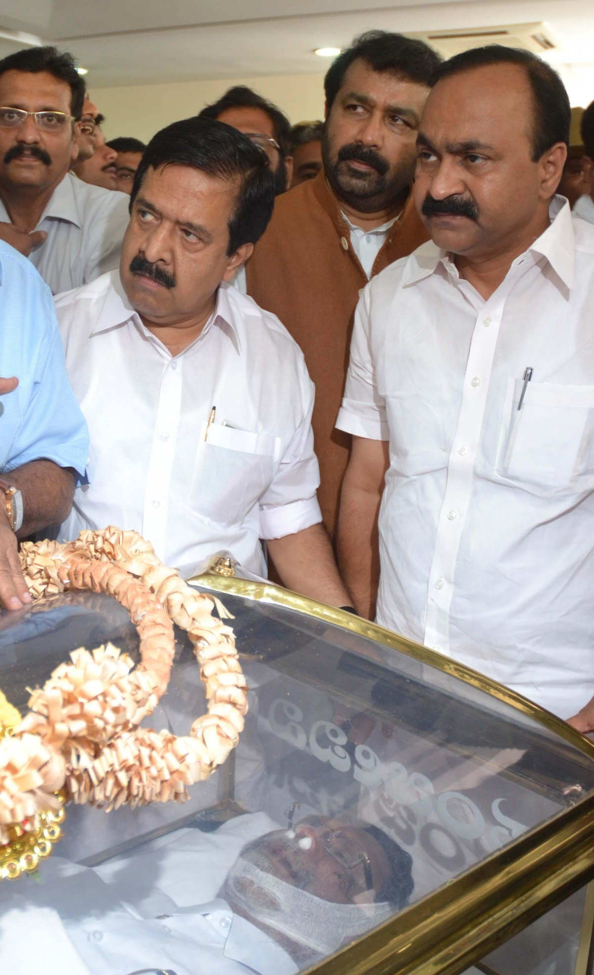 Kerala ministers paying tribute to G Karthikeyan