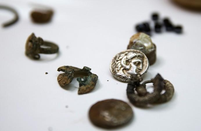 Coins and jewellery from the time of Alexander the Great are displayed in Jerusalem March 9. 2015. Coins and jewellery from the time of Alexander the Great are displayed in Jerusalem March 9. 2015.