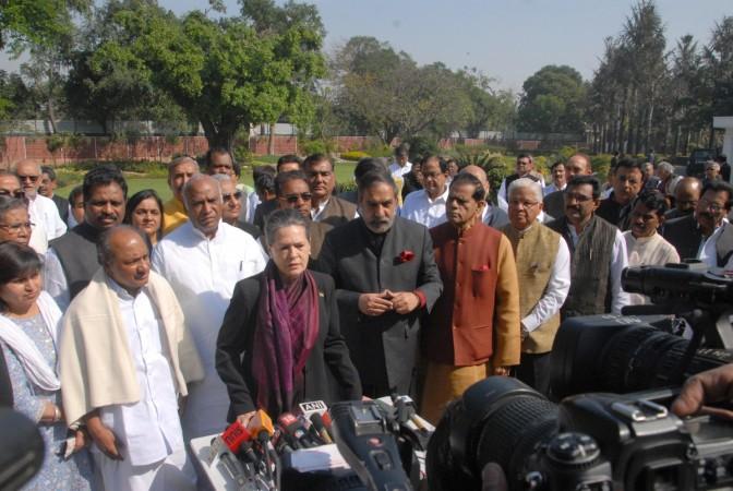 Congress chief Sonia Gandhi addresses press in New Delhi, on March 12, 2015. Also seen leader of the Congress parliamentary party in Lok Sabha Mallikarjun Kharge, Anand Kumar and others. (Photo: IANS
