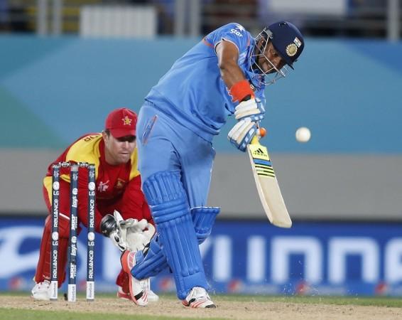 India batsman Suresh Raina smacks one to the boundary during his brilliant hundred against Zimbabwe in their ICC Cricket World Cup 2015 match Suresh Raina India Brendan Taylor Zimbabwe ICC Cricket World Cup 2015