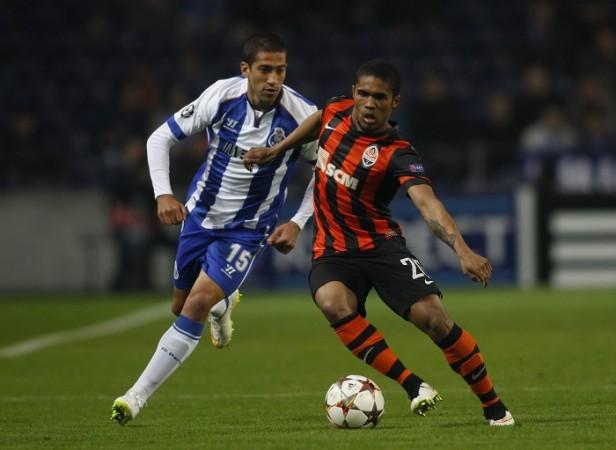 Costa (right) has found a lot of success at Shakhtar since his €6 million switch from Brazilian side Grêmio in 2010 Douglas Costa