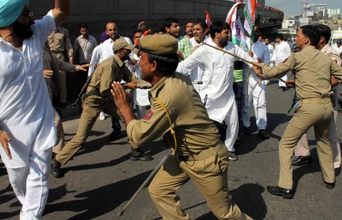 UP Police resorted to lathi-charge to disperse the mob. police lathicharge