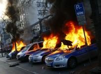 German police cars set on fire