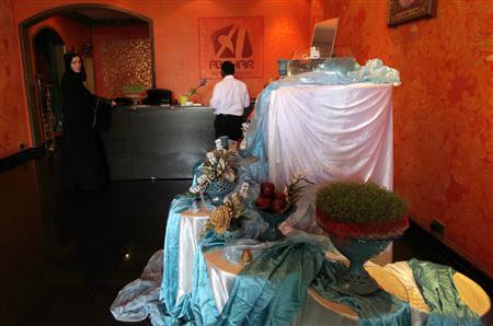 A table set with decorations is seen at Iranian restaurant Abshar in Dubai March 20, 2013 to celebrate the Iranian New Year.