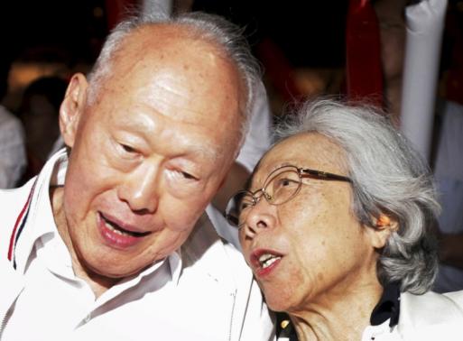 Singapore's Minister Mentor Lee Kuan Yew and his wife Kwa Geok Choo attend a May Day rally in Singapore in this May 1, 2006 file photo.