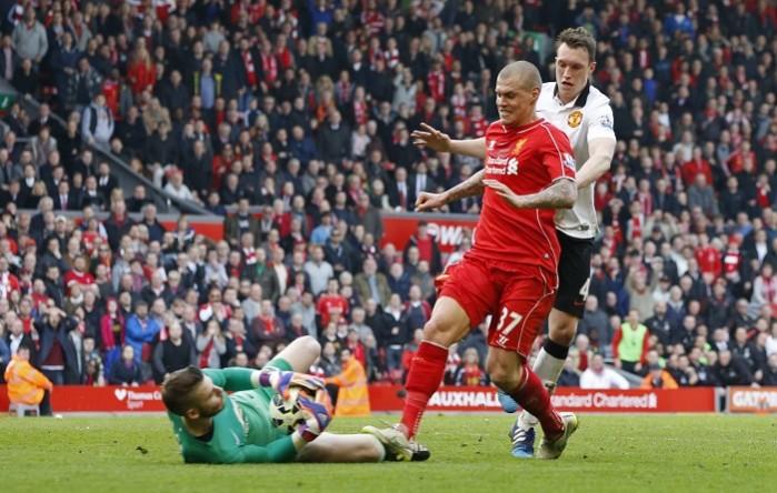 Liverpool's Martin Skrtel stamps on Manchester United's David De Gea during the two sides' Premier League clash at Anfield Martin Skrtel