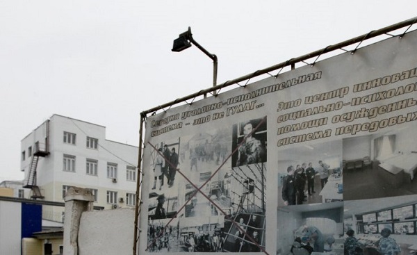 An information board is on display on the fence of a tuberculosis hospital in Russia's Siberian city of Krasnoyarsk