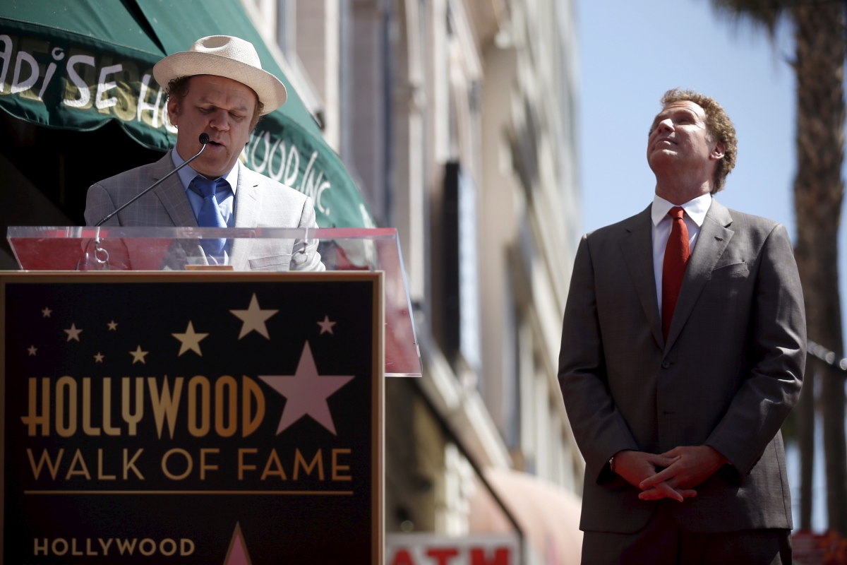 Actor Will Ferrell (R) listens as actor John C. Reilly reads him a poem before his star was unveiled. Will Ferrell Hollywood Walk of Fame