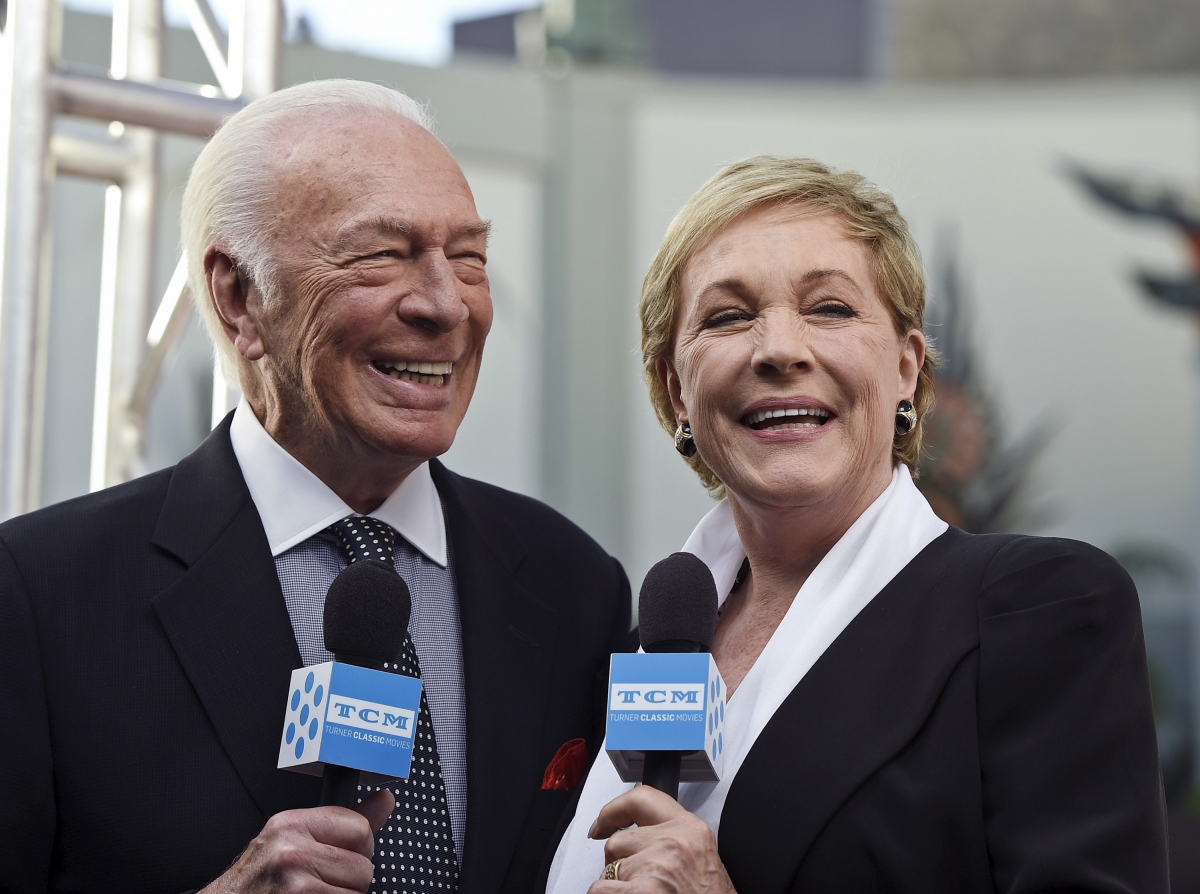 Cast members Christopher Plummer (L) and Julie Andrews are interviewed during the 50th anniversary screening of musical drama film  Julie Andrews