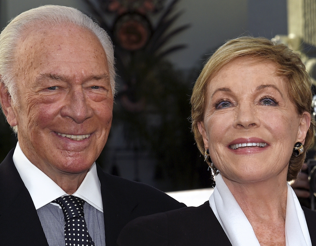Cast members Christopher Plummer (L) and Julie Andrews pose during the 50th anniversary screening of musical drama film  Julie Andrews