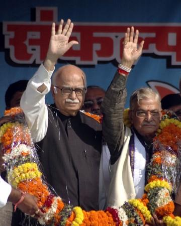 BJP leaders LK Advani and Murli Manohar Joshi wave to their supporters at a public rally in Varanasi on 18 October, 2008. Advani Joshi