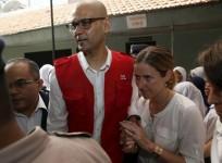 Canadian teacher Neil Bantleman (L) with his wife Tracey