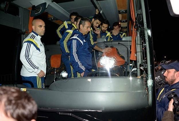The Fenerbahce players and coaching staff exit the bus after the attack Fenerbahce