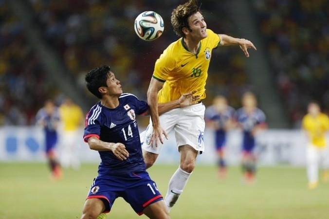 Muto (left) has had an impressive start to the new J-League season Yoshinori Muto