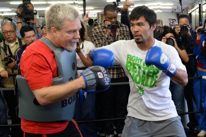Freddie Roach wants to bring Pacquiao's left hand punch back Freddie Roach