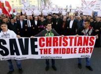 Assyrians hold banners take out a march in Beirut, Lebanon, February 28, 2015 after Isis in northeast Syria abducted Assyrian Christians