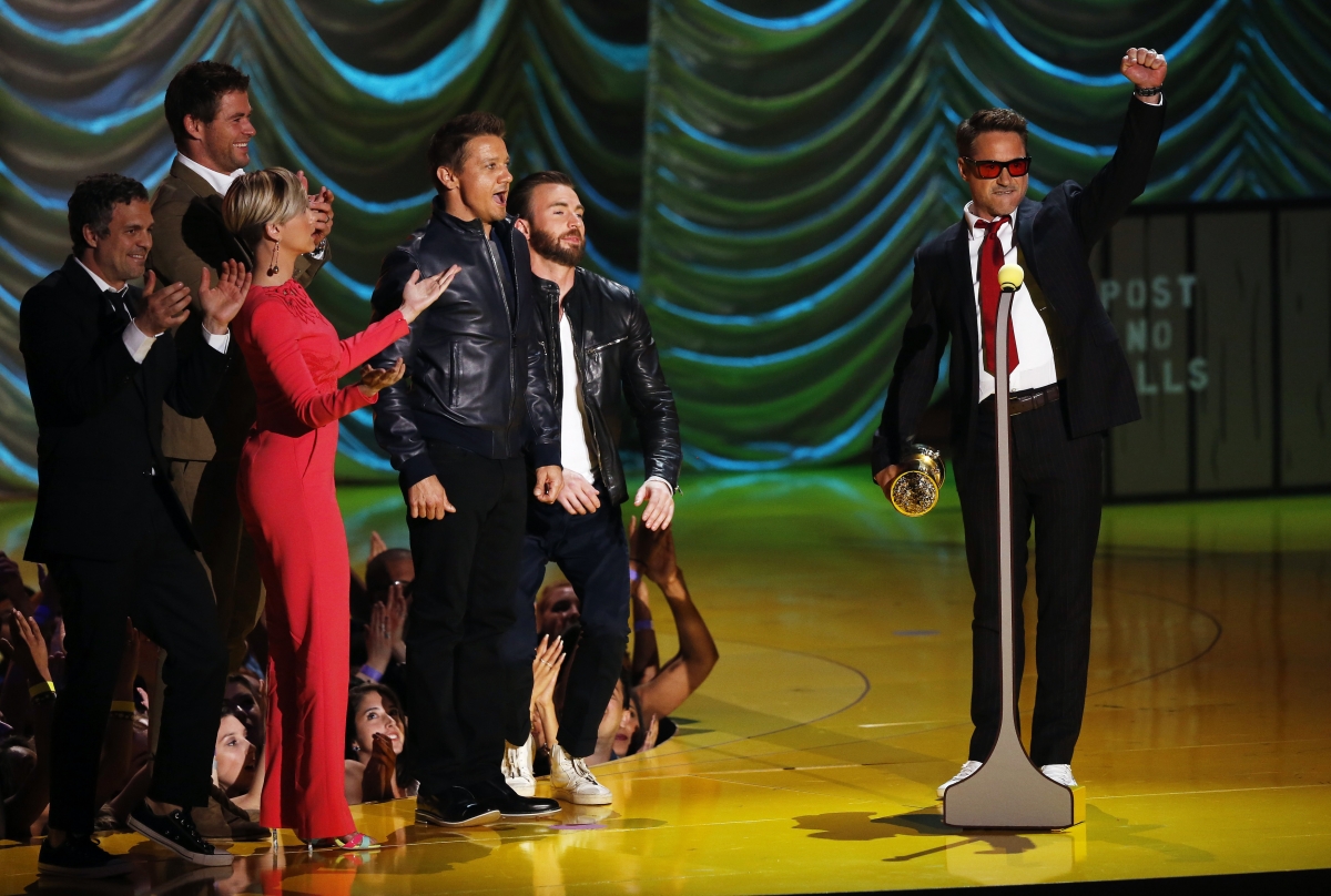 Robert Downey Jr Accepts the MTV Generation Award from 'Avengers' co-stars. Robert Downey Jr Accepts the MTV Generation Award from 'Avengers' co-stars