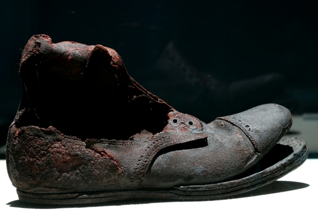 A shoe is on display at the The Titanic Remains