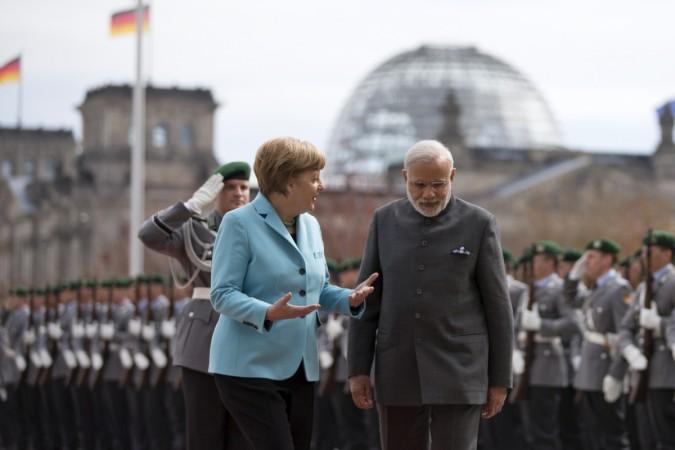 German Chancellor Angela Merkel welcomes India's Prime Minister Narendra Modi in the Chancellery in Berlin on April 14, 2015. Narendra Modi