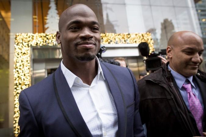 Vikings 'fully expect' Adrian Peterson back in 2015