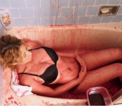 Californian model Chanel takes bath in pig blood Californian model Chanel takes bath in pig blood