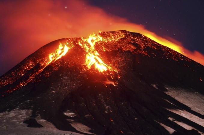 Ash and lava spew from the Villarrica volcano, as seen from Pucon town in the south of Santiago.