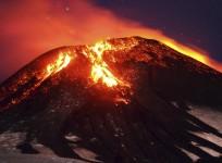 Ash and lava spew from the Villarrica volcano, as seen from Pucon town in the south of Santiago.