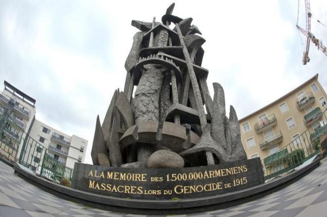 A monument with the inscription at its base, ''To the Memory of the the 1,500,000 Armenians who were Massacred during the Genocide in 1915'' is seen in a square in Decines, near Lyon, December 22, 2011. A monument with the inscription at its base, ''To the Memory of the the 1,500,000 Armenians who were Massacred during the Genocide in 1915'' is seen in a square in Decines, near Lyon, December 22, 2011.