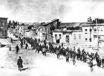 Armenians are marched to a nearby prison in Mezireh by armed Turkish soldiers. Kharpert, Armenia, Ottoman Empire, April, 1915